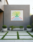 A modern outdoor patio courtyard with a gray wall, geometric tile flooring, potted plants, and a framed colorful abstract artwork mounted in the center.