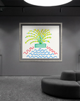 Dark grey sales floor setting with rounded couch seating, a sales desk, grey/black/white clothing hanging on racks on each side of a bright, colorful abstract piece of artwork