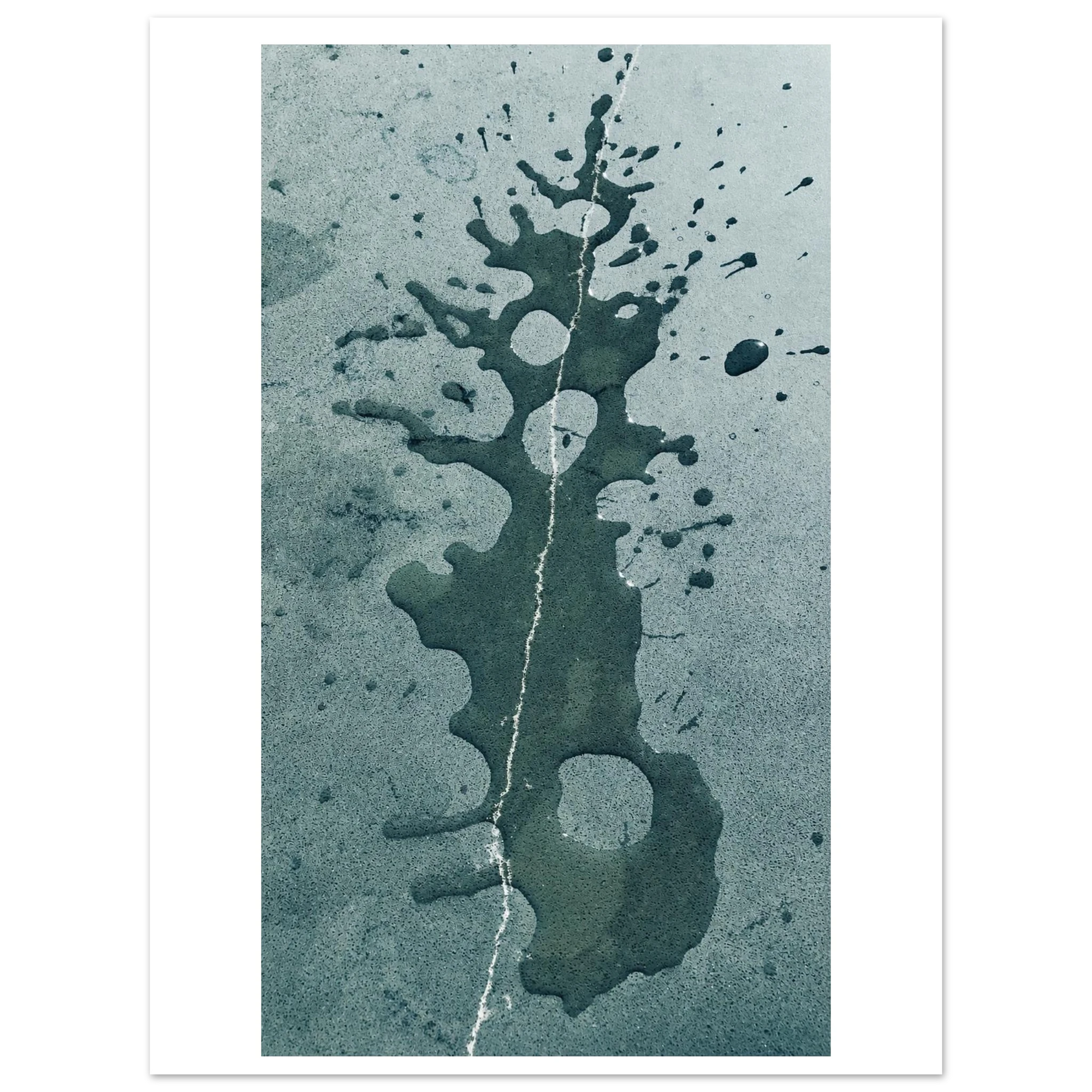 An abstract art print featuring a dark green ink splatter and drip pattern on a textured, desaturated teal-gray background, presented with a white border.
