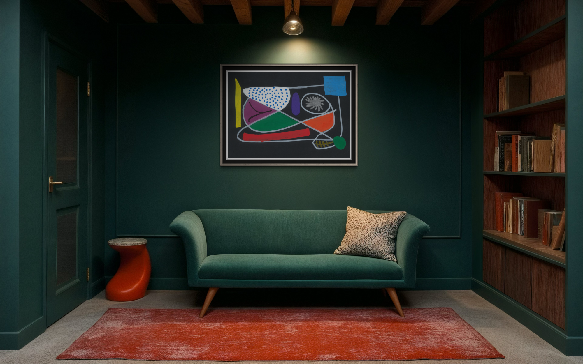 Modern living room with a green sofa, colorful abstract painting, and bookshelf.