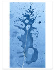 An abstract art print featuring a vertical blue ink splatter design on a textured light blue background, presented with a white border.