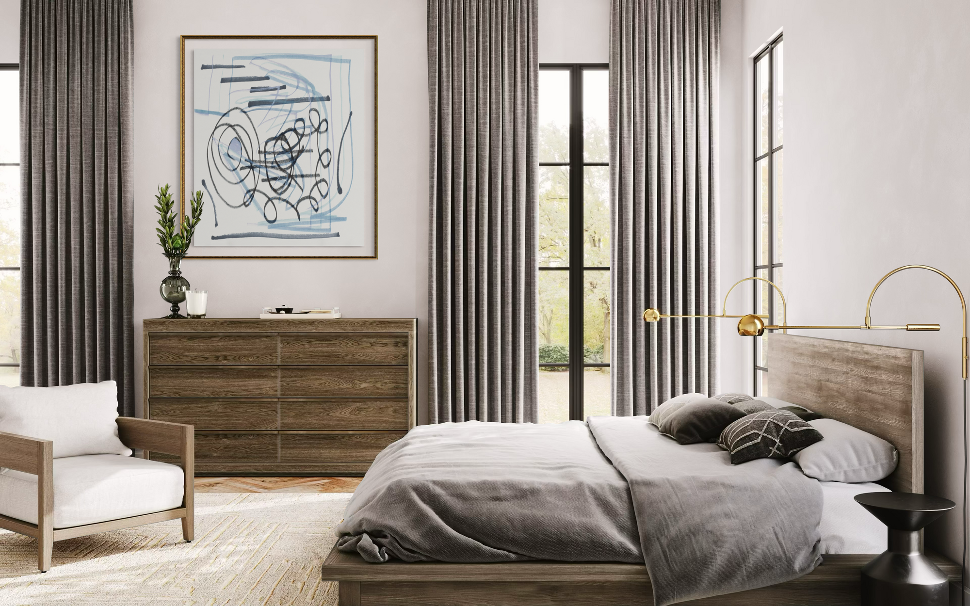 A styled bedroom interior featuring a bed with gray bedding and a light wood frame, matching gray curtains, a wooden dresser, a white armchair, and a blue abstract wall art print.