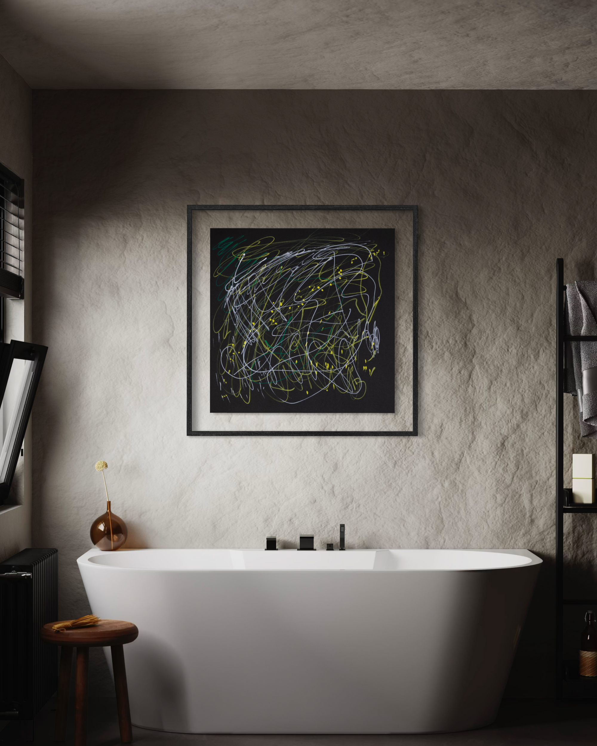 A framed abstract black painting with colorful scribbled lines hangs on a textured plaster wall above a white freestanding bathtub in a moody bathroom setting.